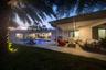 View of the backyard toward the pool and home