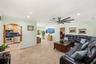 Spacious & Flexible Living Room,18" Travertine Tile Floors Throughout the entire home. IMPACT WINDOWS & DOORS!