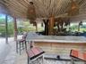 Lower sand Tiki bar. One of several bars on property.