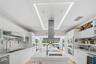 Modern kitchen with a large island and sleek finishes.