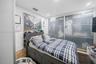 Comfortable Secondary Bedroom 3 featuring a spacious built-in closet and a clean, modern layout.