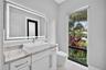 Downstairs guest bathroom / cabana bathroom, privately located by foyer. Also accessible via side door