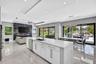 Chef's kitchen w/ counter seating, quartz waterfalls, 2 ovens, pot filler, tons of storage, KraftMaid cabinets