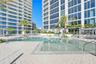The "sunrise" pool area with beach shelfs & cabanas for tanning & relaxation.