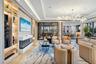 The fireplace is warm right now in this cool weather in our social room "The Wave"