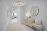 The entryway of the condo, chandelier not included. Virtually staged.
