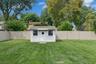 Yard with storage shed