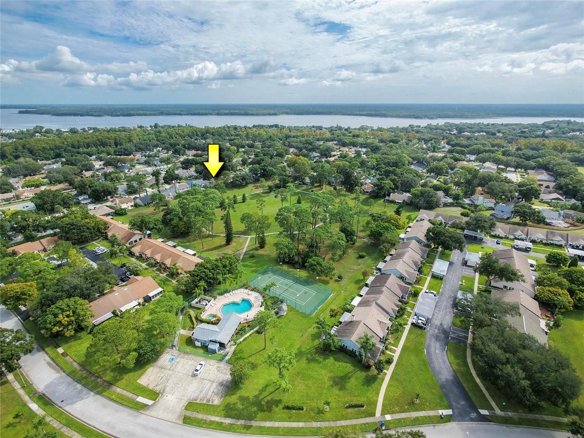 Hamlet at Bently Park, Lake Tarpon in the background, you can see the comunity pool, walking trails, tennis/pickleball courts available only to the re