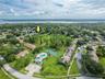 Hamlet at Bently Park, Lake Tarpon in the background, you can see the comunity pool, walking trails, tennis/pickleball courts available only to the re
