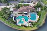 A closer aerial view of the pools and the clubhouse