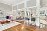Custom molding surrounds the vaulted ceiling