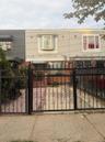 Gated front yard with parking