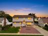 Two-story residence with siding and stone facade