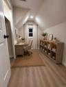 Primary Bedroom Office/Nursery/Walk-In Closet. Digitally Staged.