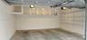 Enclosed two car garage plus storage space