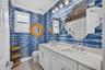 Two sinks with combo shower/tub