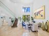 Living Room with Glass Stair Railings