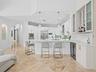 Counter Dining in Kitchen with Custom Built in Bar