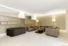 Living area featuring baseboards