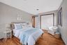 Virtual 3rd bedroom, wood floors and the double closet system, which is also in the other 3.