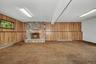 Walkout Family room with woodburning fireplace