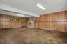 Walkout Family room with woodburning fireplace