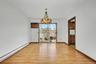 Dining room featuring sliders to deck and hard wood floors