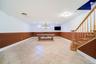 Spacious room featuring radiant heated tile floor, recessed lighting and a sound system.