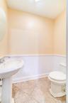 Bathroom #5 is a 1/2 bath and is on the basement level.