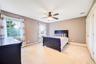 Bedroom #3 is large and has ceiling fan with integrated lighting. Carpeted with room for multiple sleeping arrangements