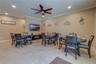 This HVAC system has six zones. Each suite controls their own air and the 6th zone is for this common room. It is large enough for several tables or e