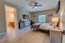 One of the guest room suites. Each suite is designed to have a small fridge as well as a TV. Because all 5 rooms are ADA compliant, the doors are extr