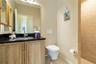 This is the second full bath with walk-in shower. This bathroom sits between bedrooms two and three in this split floor plan.