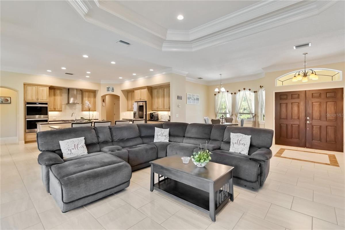 This home has an open floor plan. There are ten foot ceilings throughout the home and a tray ceiling in the great room (as shown above) and the primar