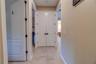 Another picture of the water heater closet. The three open doors lead to individual suites. They are numbered  for the convenience of the guests.