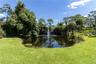 To the right is the firepit. The guest house and the main house both overlook this stunning back yard.