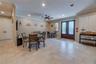 The double doors to the right is a pantry. The double doors to the left houses the water heater and storage. There are two water heater closets. One o