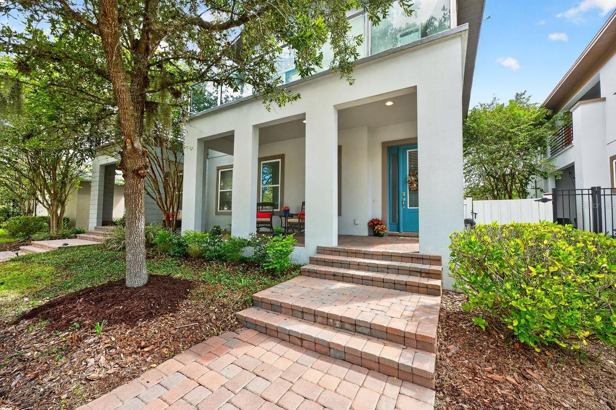 Low maintenance Lake Nona living with elevated style, flexible space and an unbeatable Laureate Park lifestyle!