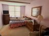 Second bedroom with pocket doors if you wish to convert to additional living area, den, office or tv room with large, oversized closet