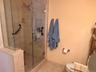 Walk in glass shower as shown