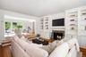 With the third fireplace showing easy access to kitchen & eating area