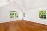 Showing vaulted ceiling and beams