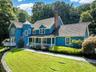 Showing covered front porch and balcony