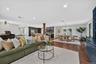 Loft-like, Open floor plan--Hardwood flooring throughout, recessed lighting, and a chandelier-lit dining area