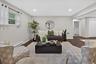 Lower-level. Recessed lighting, wood-finish flooring, white trim, and white paneled doors