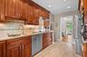 Kitchen with stainless steel appliances and soft close drawers and cabinets