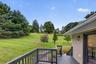 Expansive green space with mature trees