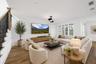 Casual lounge with staged furniture for perspective.