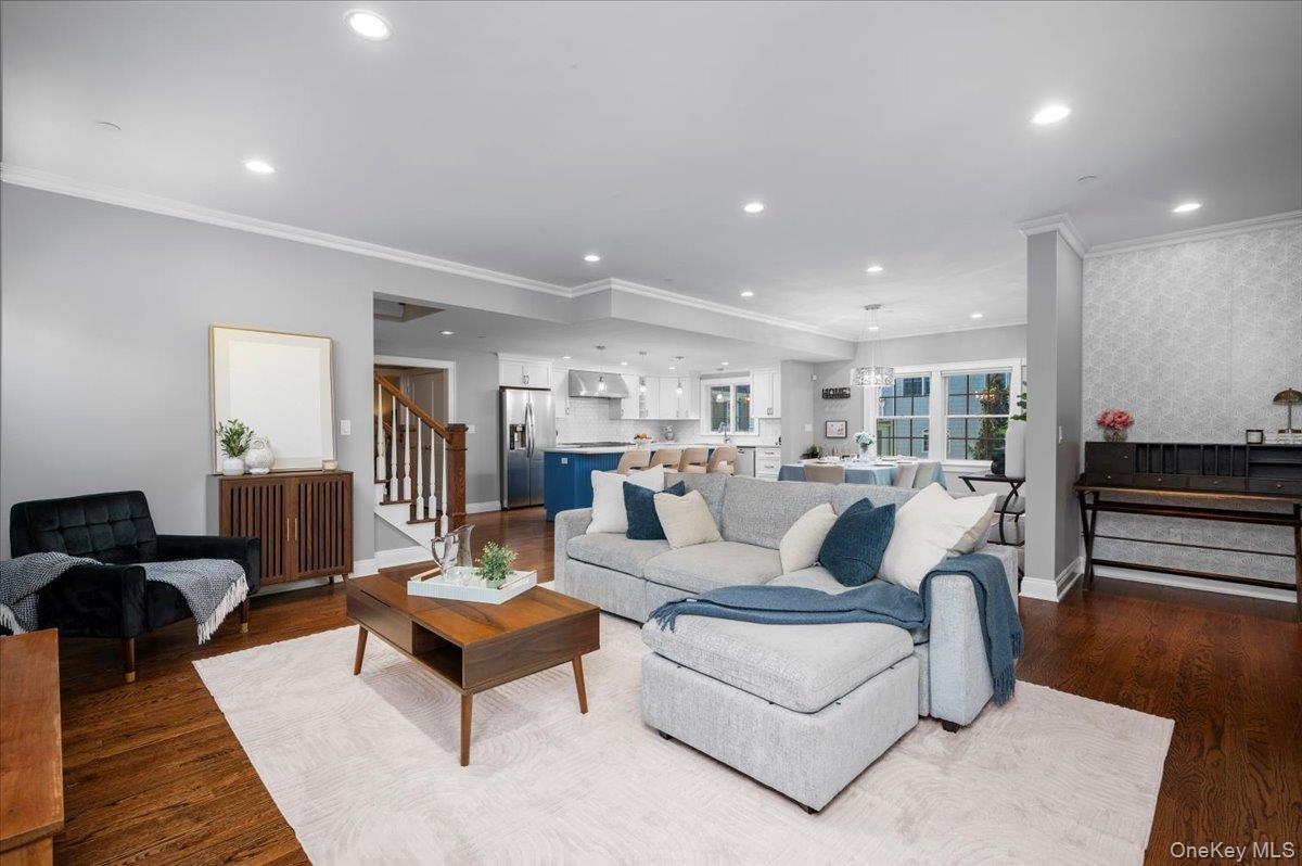 Large family room open to kitchen with office or bar book!