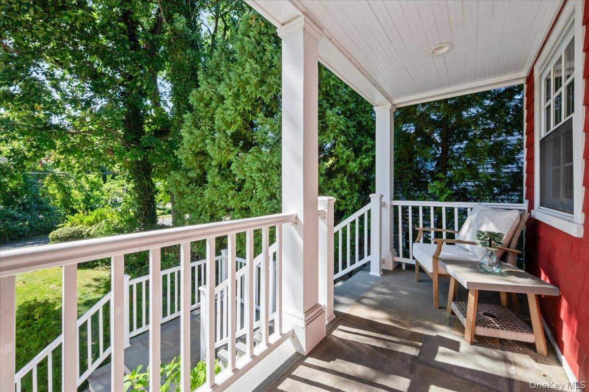 Covered front porch, great for overseeing the action in the neighborhood
